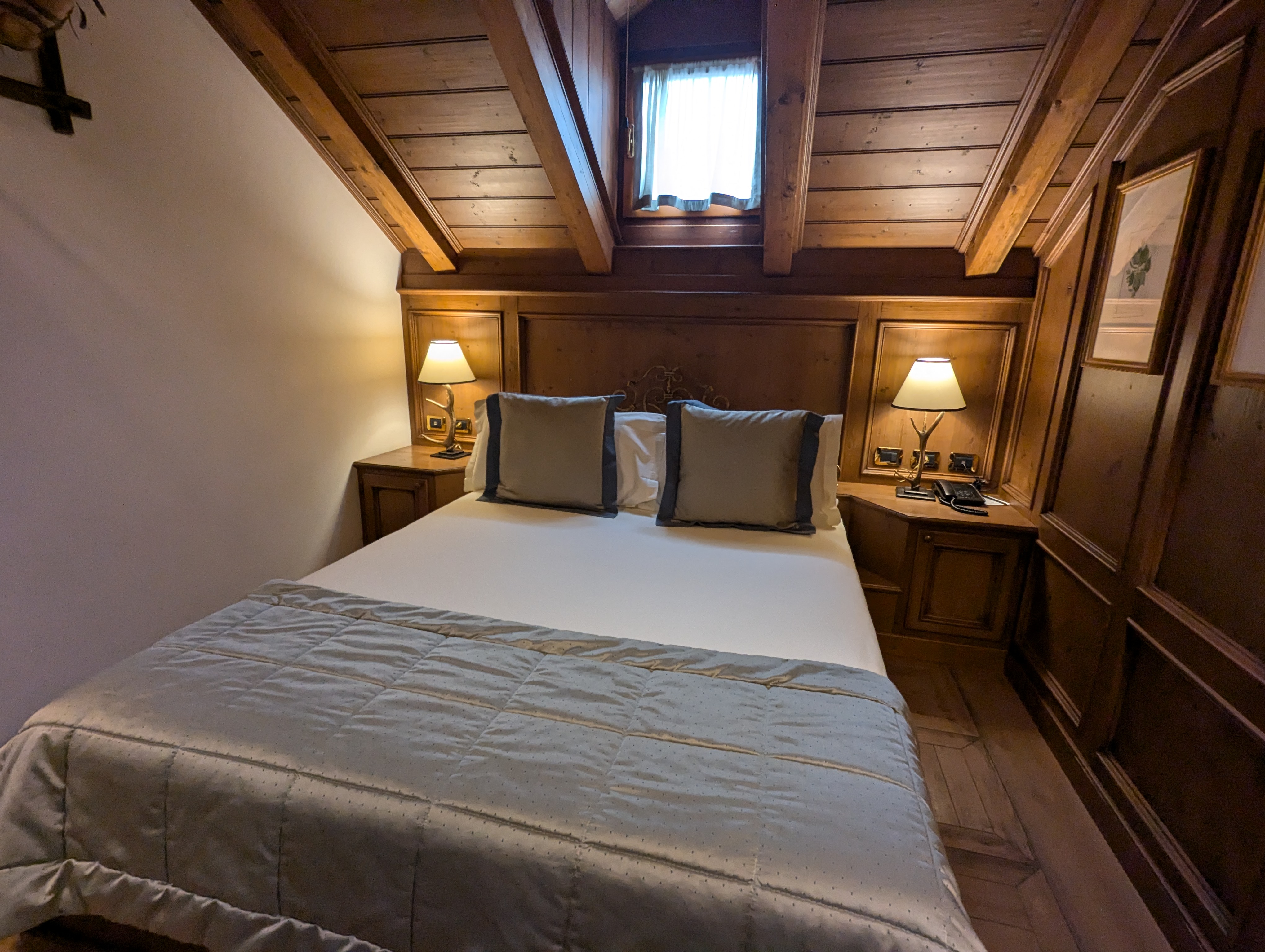 A characturful double room at Hotel Ambra in Cortina