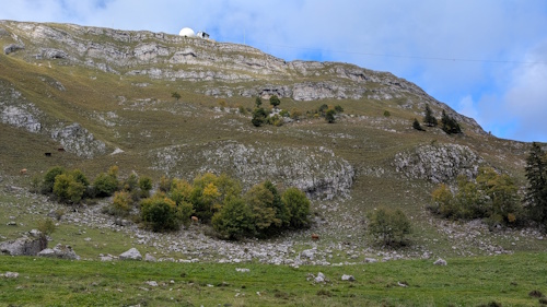 Looking back to the summit of La Dole, the final summit on the Jura Crest Trail