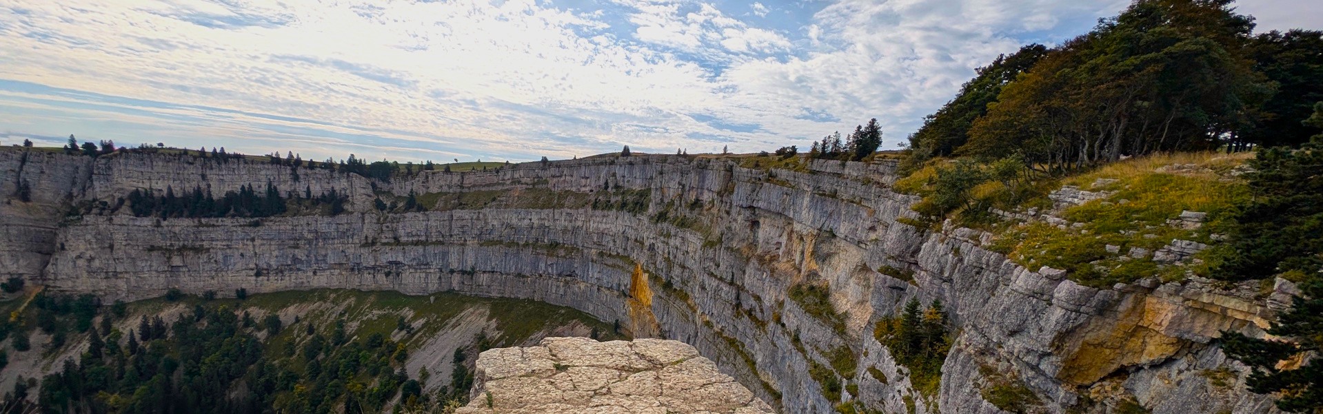 Towering cliffs of the Creux du Van on stage 2