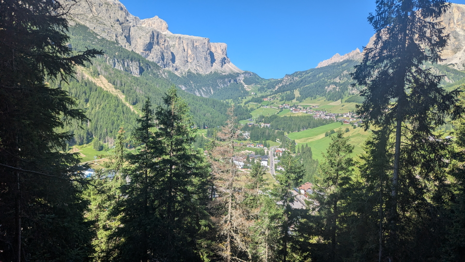 A long view on the Alta Via 9 to Passo Gardena, Corvara below