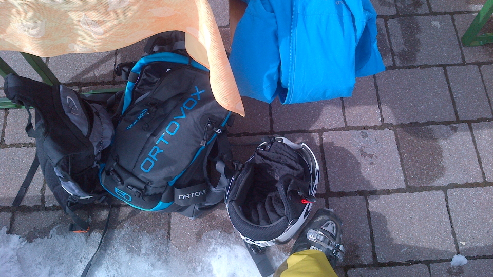 Rucksack and coat, sking above Zell-am-See