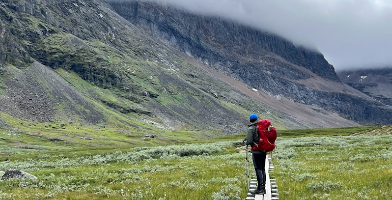 A hiker looking down the valley
